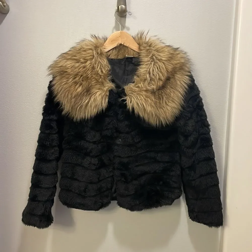KAPOK Woman’s Black Faux Fur Coat With Faux Brown And Tan Trim Around The Neck